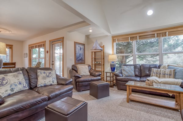 Living room with seating and vibrant accents